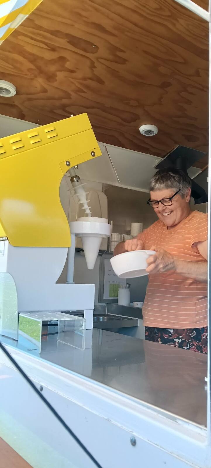 Carol Fisher serving real fruit ice cream from the Stone Soup van
