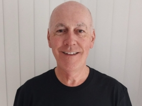 Mike Stevens smiling, a Dementia North Ōrewa Walking Group volunteer