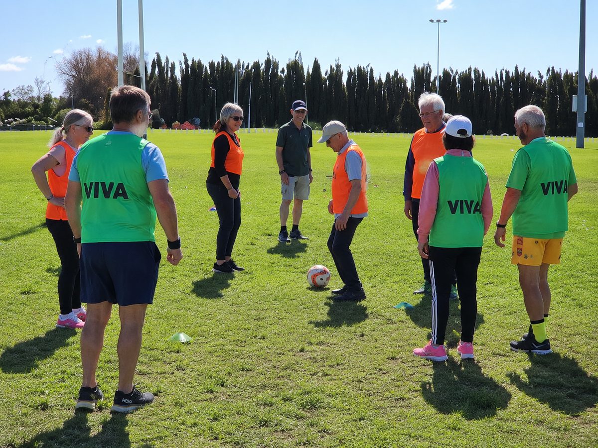 Sporting Memories Kerikeri members playing walking football on a sports field